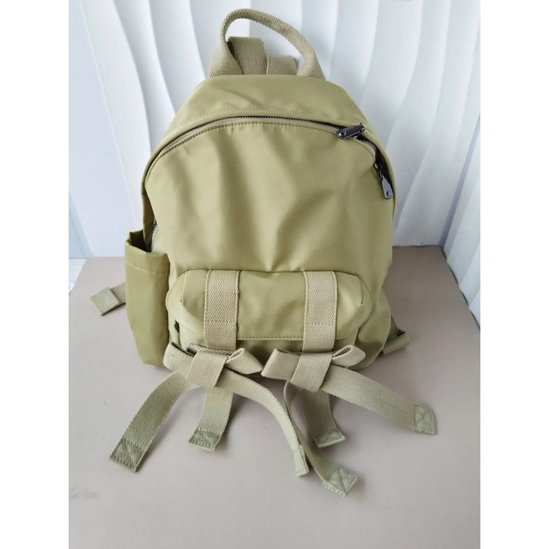Bow Behavior Beaded Backpack